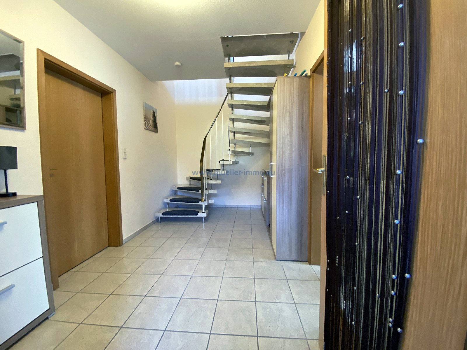 Sehr ruhige Lage, gepflegte Doppelhaushälfte mit Garage in Leer