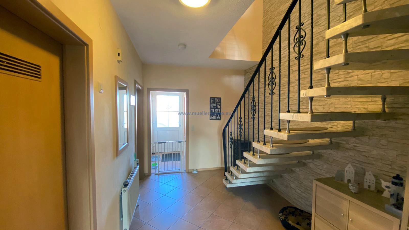 Doppelhaushälfte in Randkanallage in Moormerland M 2430